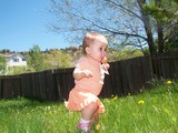 Mary running in the yard.