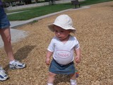 Mary in her jean skirt and floppy hat, her shirt reads 'I love my daddy'